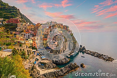 Manarola, Colorful cityscape on the mountains over Mediterranean sea in Cinque Terre Italy Stock Photo
