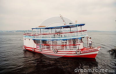 Manaus, Brazil - December 04, 2015: holiday cruiser ship on seascape. Pleasure boat float along sea coast. Summer Editorial Stock Photo