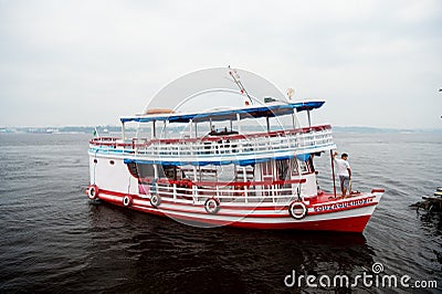 Manaus, Brazil - December 04, 2015: holiday cruiser ship on seascape. Pleasure boat float along sea coast. Summer Editorial Stock Photo