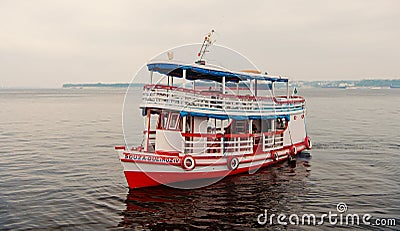 Manaus, Brazil - December 04, 2015: pleasure boat float along sea coast. Holiday cruiser ship on seascape. Summer Editorial Stock Photo