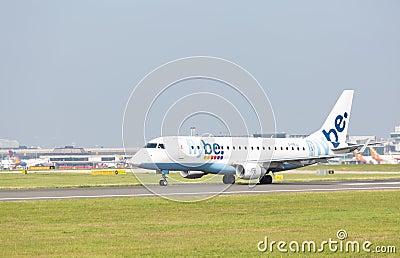 Flybe Embraer ERJ-175STD just starting to take off Editorial Stock Photo