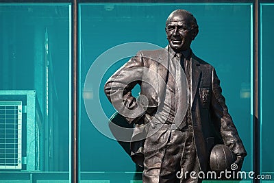 Sir Matt Busby Bronze statue at Old Trafford stadium in Manchester, UK Editorial Stock Photo