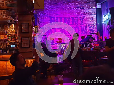 Atmospheric evening capture inside Bunny Jacksons funky sports pub in Manchester One development area in Manchester city centre Editorial Stock Photo