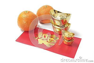 Mandarins, gold Ingots and Red Packet Stock Photo