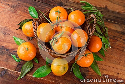 Mandarins tangerines basket. Top view Stock Photo