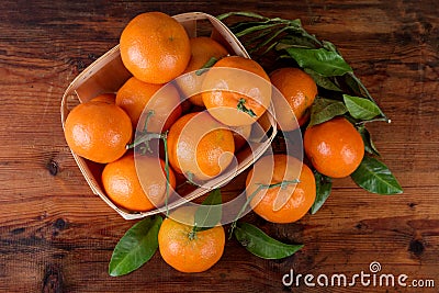 Mandarins tangerines on wooden table top view Stock Photo