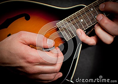 Mandolin hands Stock Photo