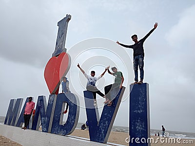 the mandvi beach of the kachh. Men have hands against the sky. Editorial Stock Photo