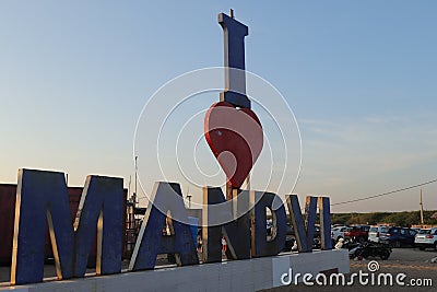 Mandvi Beach in Kutch, Gujarat, India - I love Mandvi signboard - Beach vacation Editorial Stock Photo