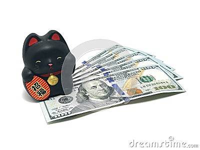 Maneki Neko, Beckoning Lucky Black Cat and Dollar Bills Stock Photo