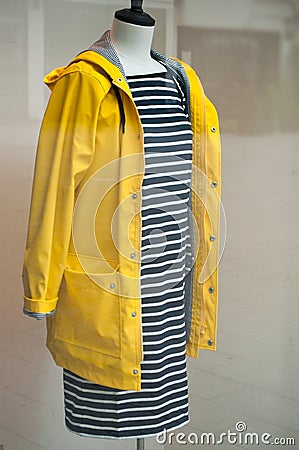 Manequin with yellow raincoat Stock Photo