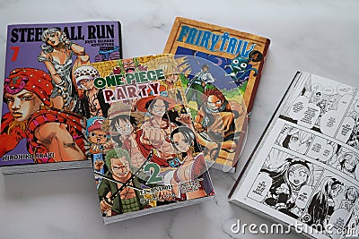 Manga books, Fairy tail, Dimention W, Jojo steel ball run, One piece, Vitoria, Spain, December of 2022 Editorial Stock Photo