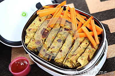 carrot coriander parathas. gajar dhaniya thepla.mangal mullangi carrot kothamilli tazhai rotti rolls, carrot coriander leaves brea Stock Photo