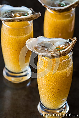 Mango Chia Rum Shooters with Oysters Stock Photo