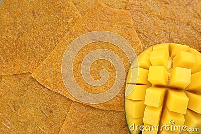 Mango on delicious fruit leather, top view. Space for text Stock Photo
