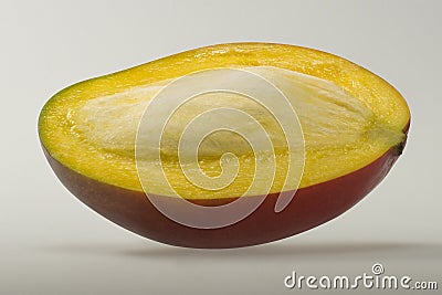 Mango fruit with pip, half Stock Photo