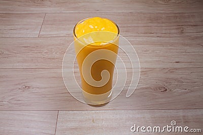 Mango lassi, yogurt or smoothie with turmeric. Healthy pro biotic Indian cold summer drinks Stock Photo