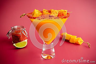 Mango Margarita with a Turmeric Chili Twist and Mango Garnish Stock Photo
