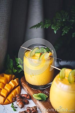 Mango and Turmeric Lassi Smoothie Ingredient Stock Photo