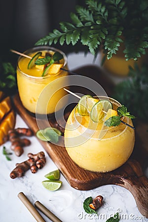 Mango and Turmeric Lassi Smoothie Stock Photo