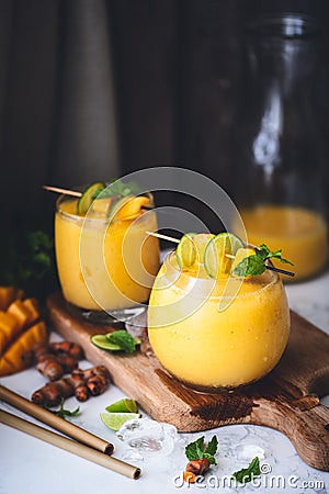 Mango and Turmeric Lassi Smoothie Stock Photo