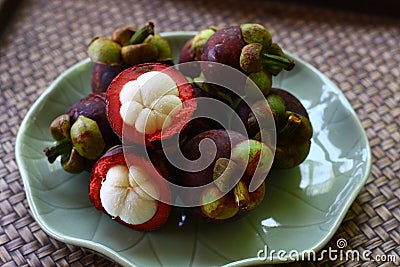 Mangosteen in the ceramic dish Stock Photo