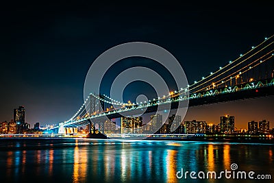 Manhattan Bridge at night, seen from Brooklyn Bridge Park, in Br Stock Photo