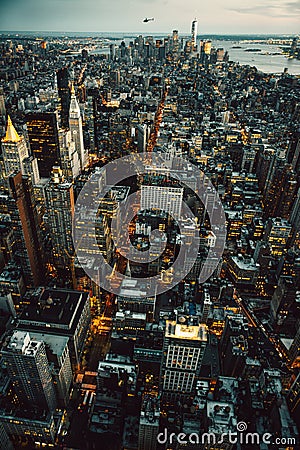 Manhattan New York City buildings lights aerial top view at the night time Stock Photo