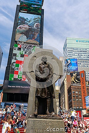 The statue of Father Duffy with street signs in Times Square, New York City Editorial Stock Photo