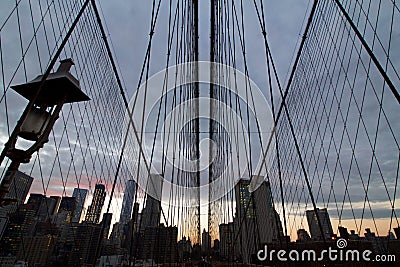 Manhattan panorama view through brooklyn bridge cables Editorial Stock Photo