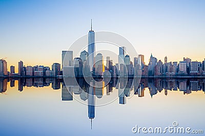 Manhattan Skyline with the One World Trade Center building at twilight Stock Photo