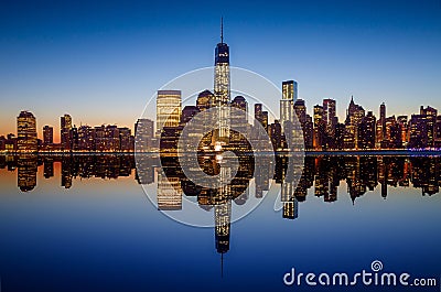 Manhattan Skyline with the One World Trade Center building at twilight Stock Photo