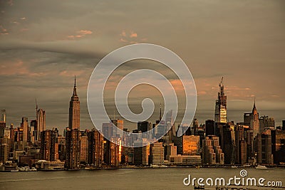 Manhattan Turns to Gold from Sunrise Over Brooklyn Editorial Stock Photo