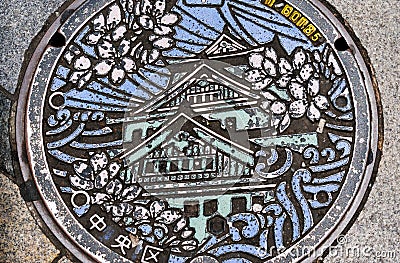 Manhole cover, Osaka Castle Editorial Stock Photo