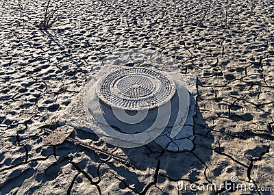 Abandoned Manhole at the Bed of a Lake Stock Photo