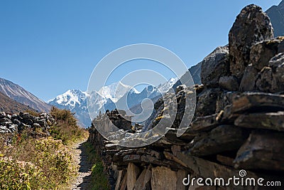 Mani Wall in Langtang Valley, Langtang National Park, Rasuwa Dsitrict, Nepal Stock Photo