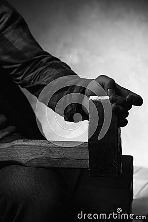 Maniac with sharp axe. Scary atmosphere Stock Photo