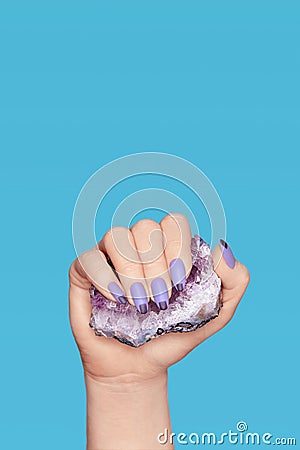 Manicure. Hand With Stylish Nails Holding Purple Gemstone Stock Photo