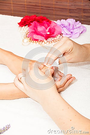 Manicure of nails from a woman's hands before applying nail polish Stock Photo