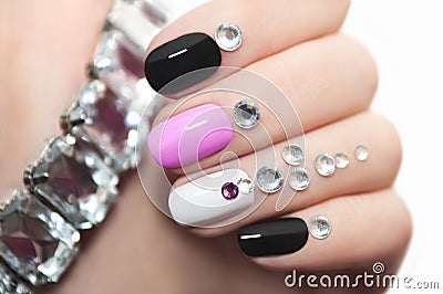 Manicure with rhinestones. Stock Photo