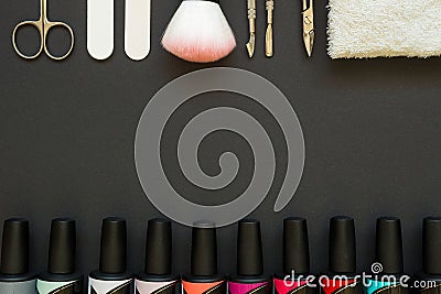 Manicure tools and polish on the dark background Stock Photo