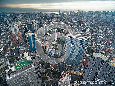 Manila Cityscape, Makati City with Business Buildings and Cloudy Sky. Philippines. Skyscrapers in Background. Editorial Stock Photo