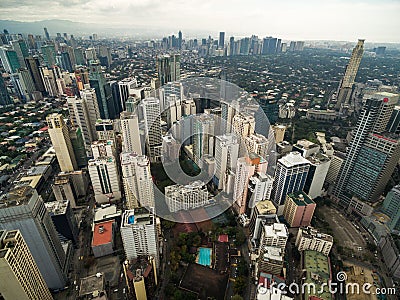 Manila Cityscape, Makati City with Business Buildings and Cloudy Sky. Philippines. Skyscrapers in Background. Editorial Stock Photo