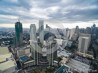 Manila Cityscape, Makati City with Business Buildings and Cloudy Sky. Philippines. Skyscrapers in Background. Editorial Stock Photo