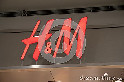Manila, 22 March 2018 - HM brand name on store entrance in SM Mall of Asia shopping mall. Everyday fashion store Editorial Stock Photo