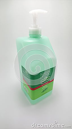 Green cross isoprophyl alcohol squeeze bottle in Manila, Philippines Editorial Stock Photo