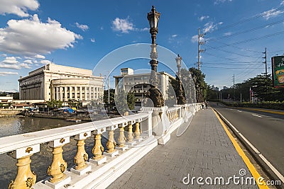 Manila, Philippines - Walking at the sidewalk of Jones Bridge. Ornate light posts adorn the refurbished walkway Editorial Stock Photo