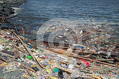 Manila, Philippines - May, 18, 2019: Ocean plastic pollution in Manila Bay shore Editorial Stock Photo