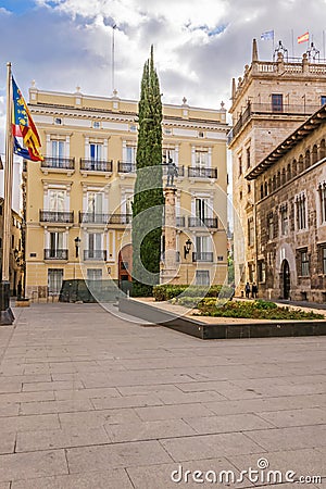 Manises Square, Hotel Palacio Vallier and statue of Francisco Pizarro in Valencia, Spain Editorial Stock Photo