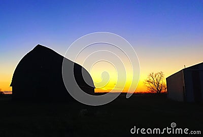 Manitoba Barn silhouette at sunset Stock Photo